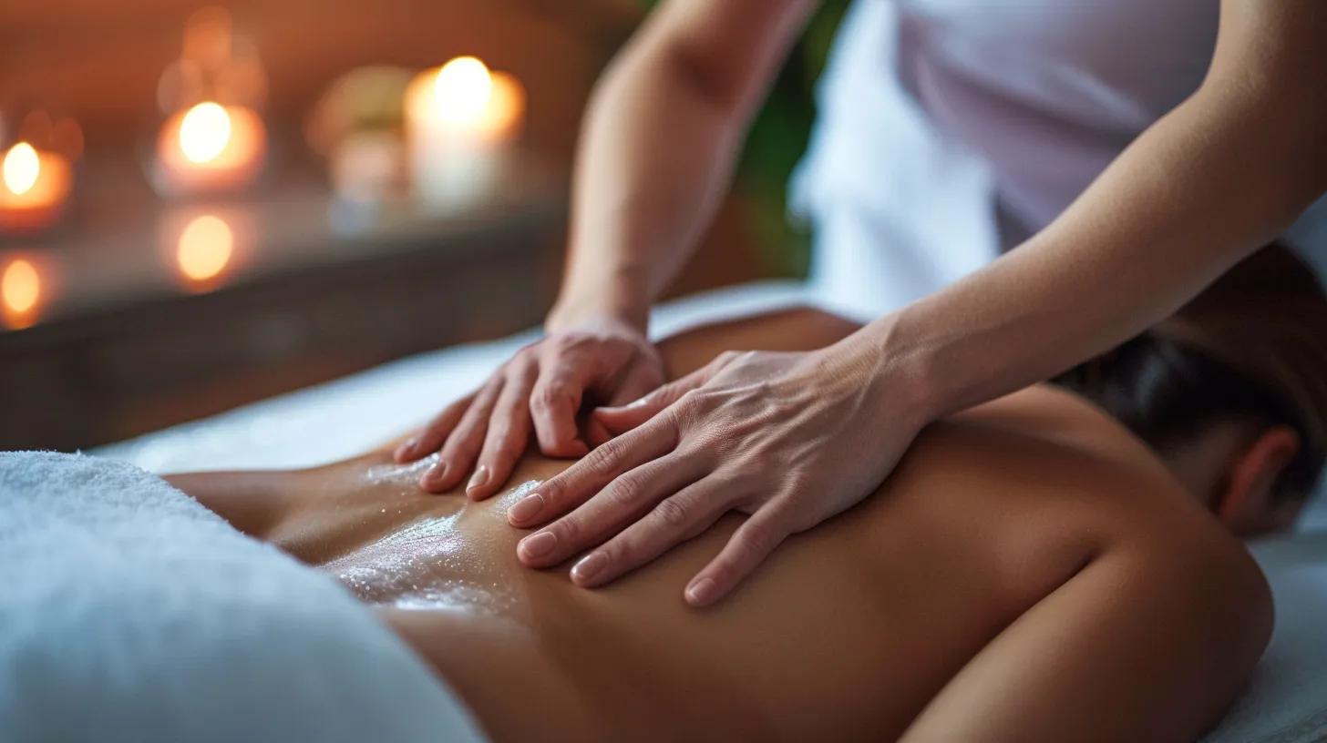 Massage therapist performing deep tissue massage on a client's back, highlighting therapeutic techniques for pain relief
